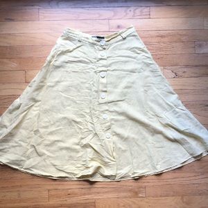 Pastel yellow midi linen skirt w white buttons